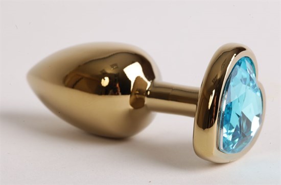 Золотистая анальная пробка с голубым стразиком-сердечком - 7,5 см. - фото 144012