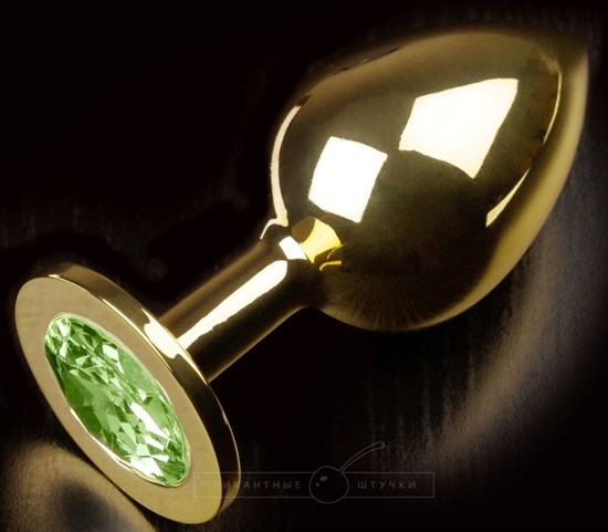 Золотистая анальная пробка с салатовым кристаллом - 9 см. - фото 157427