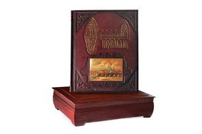 {{photo.Alt || photo.Description || 'Книга "Московский кремль из глубины веков" с металлической гравюрой, расписанной вручную'}}