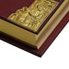 Святое Евангелие в кожаном переплете с литьем